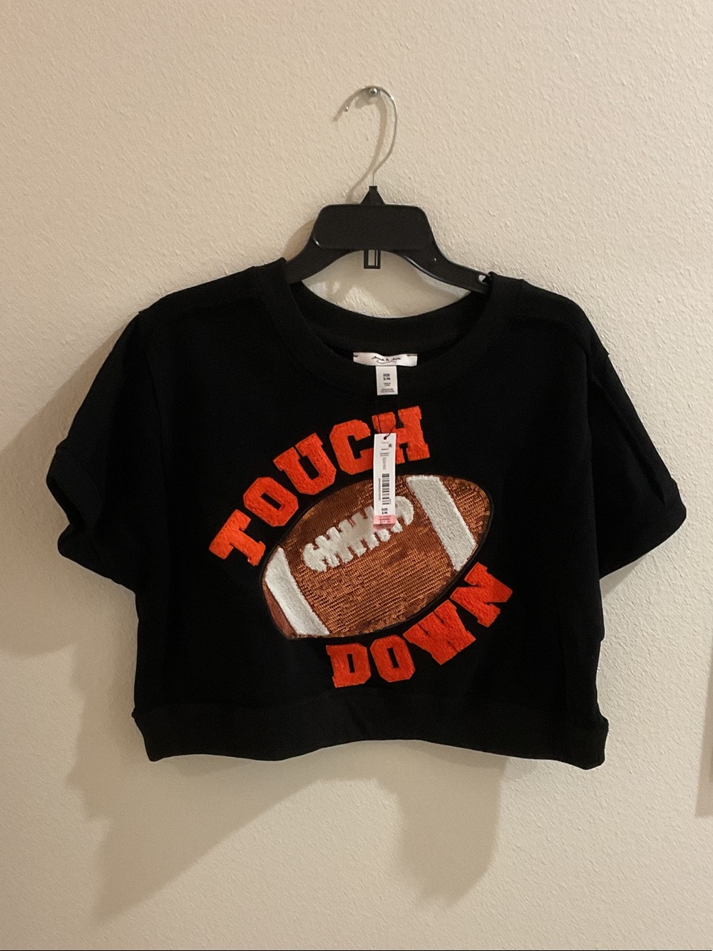 Anna & Ava Black Sweatshirt with Orange 'TOUCH DOWN' Football Graphic